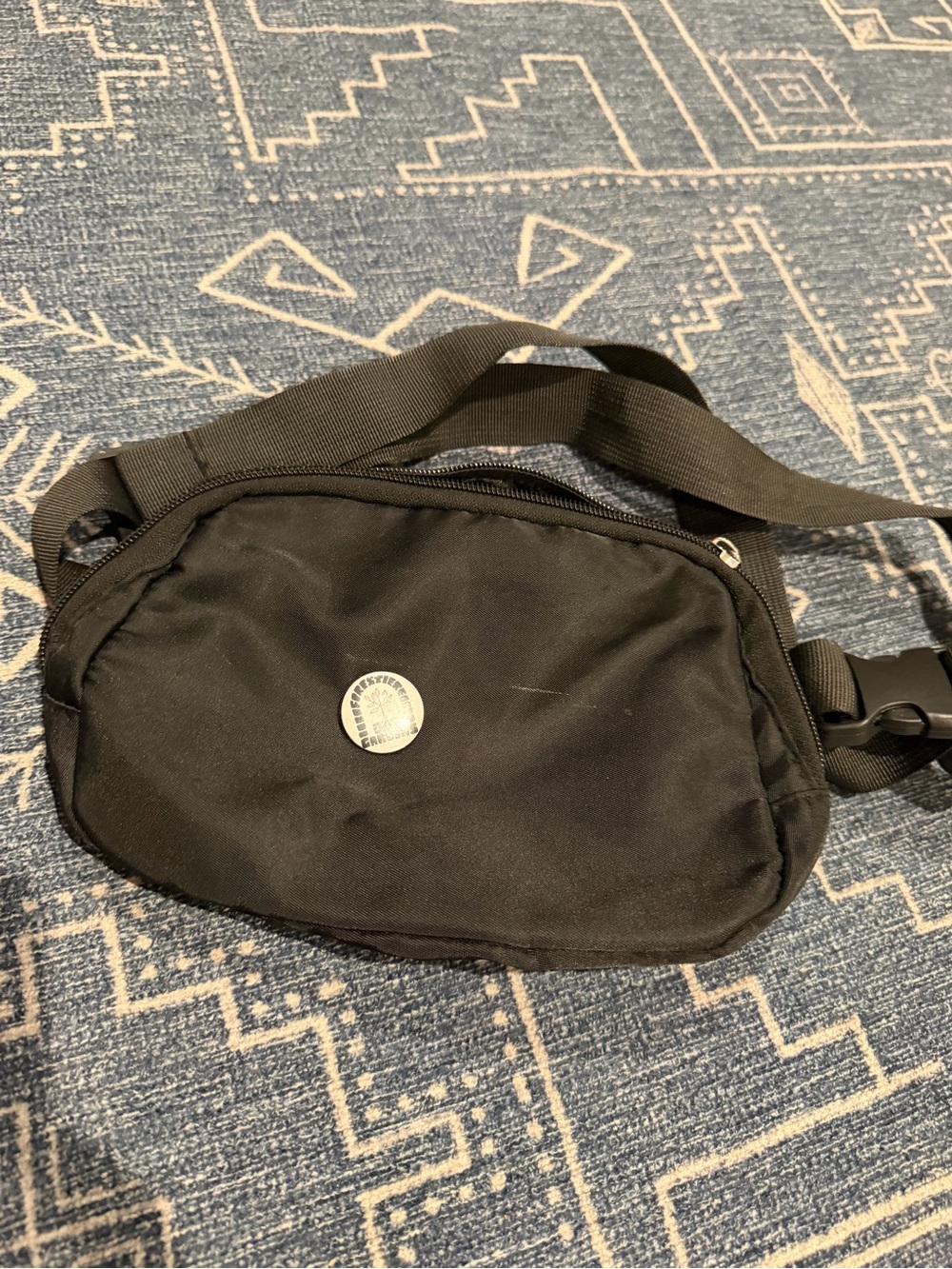 Black Crossbody Waist Bag with Silver Emblem